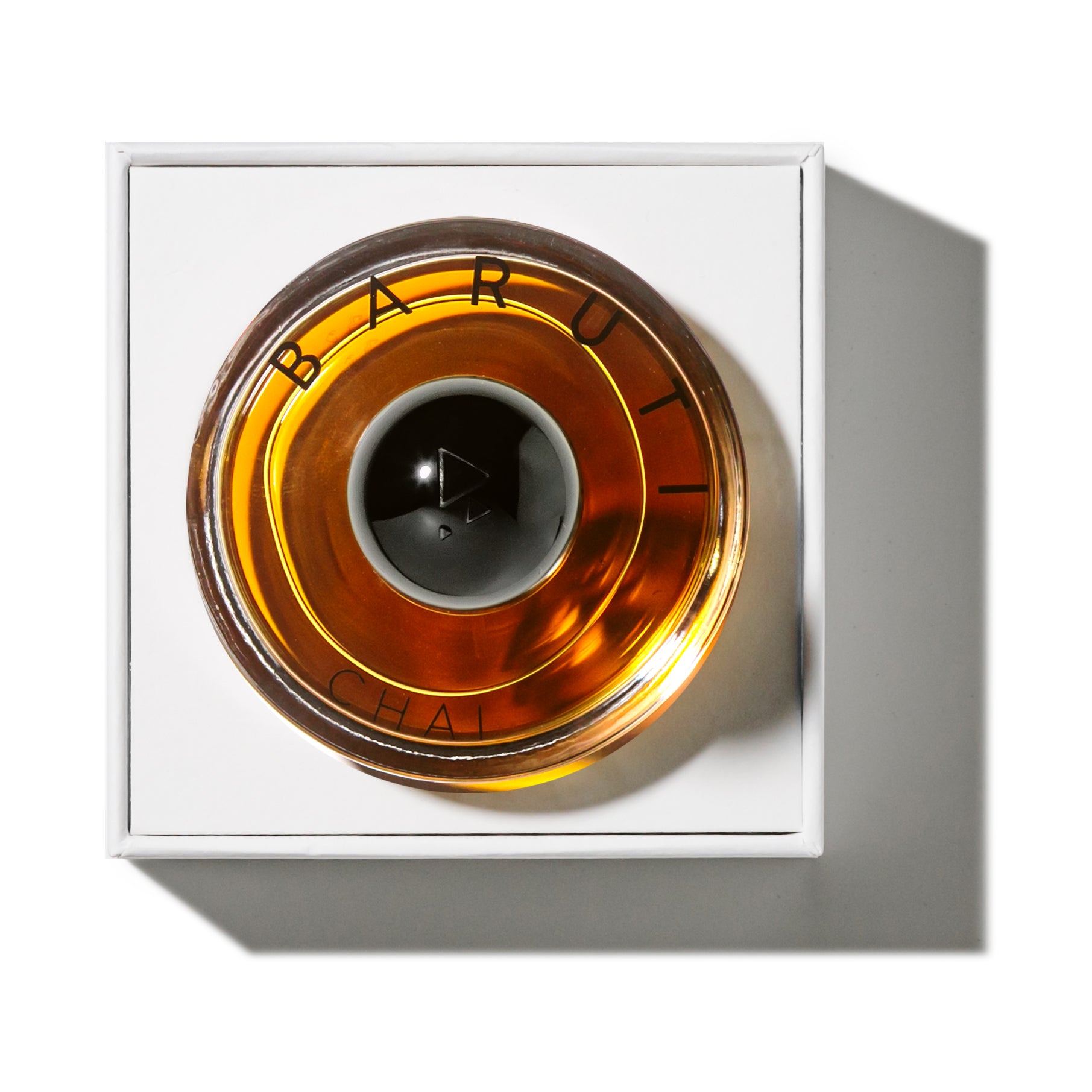 CHAI Eau de Parfum 50ml – BARUTI – vista laterale fragranza con note di cannella, cardamomo e tè nero
